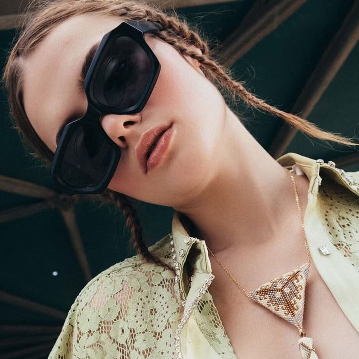 Women's designer sunglasses with distinctive geometric frame and polarized lenses Bowlift