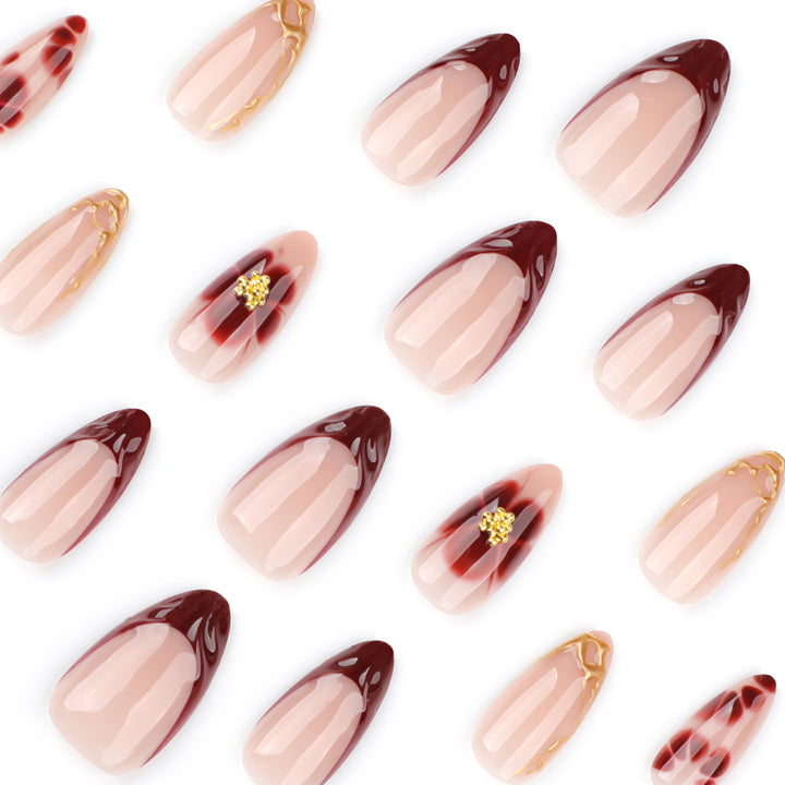 Artificial nail art with floral accents and boutique design Bowlift