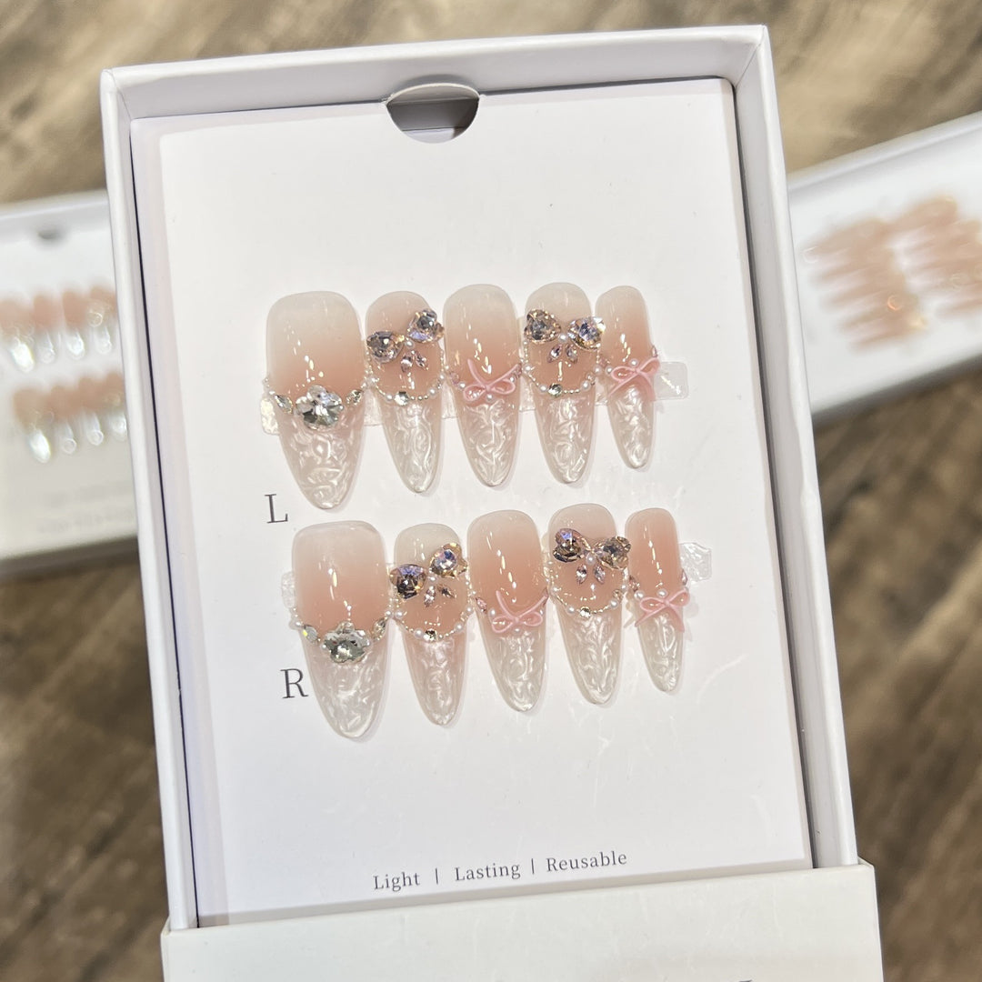 Decorative Stiletto Press-On Nail Set with Bow and Gem Accents Bowlift