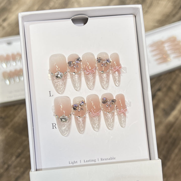 Decorative Stiletto Press-On Nail Set with Bow and Gem Accents Bowlift