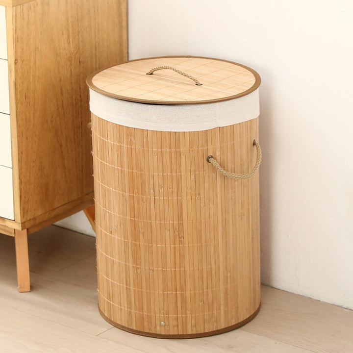 Laundry basket made of natural bamboo by Bowlift