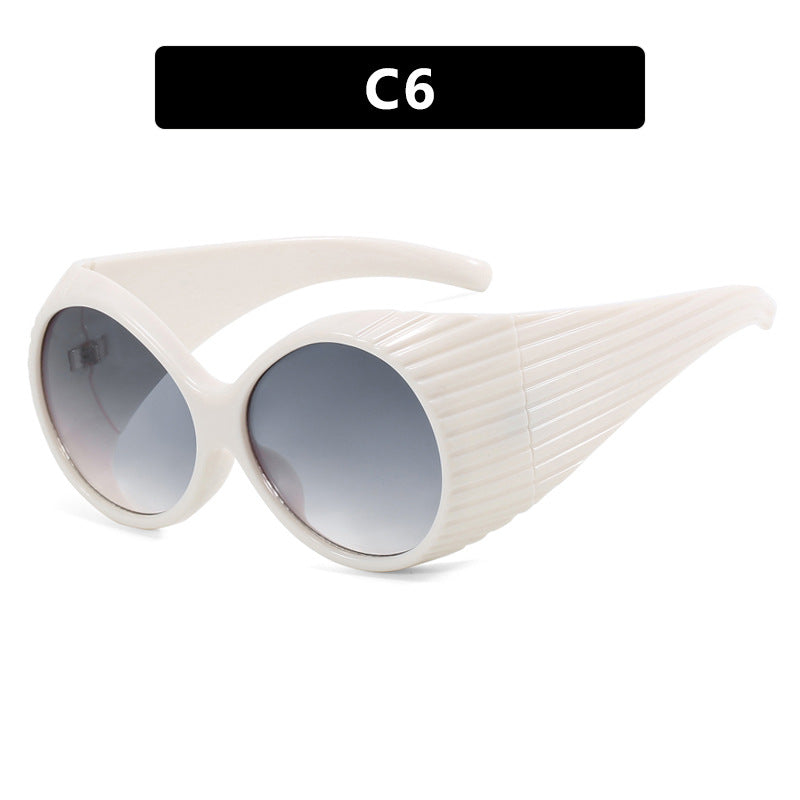 Women's extravagant sunglasses with curved frame Bowlift