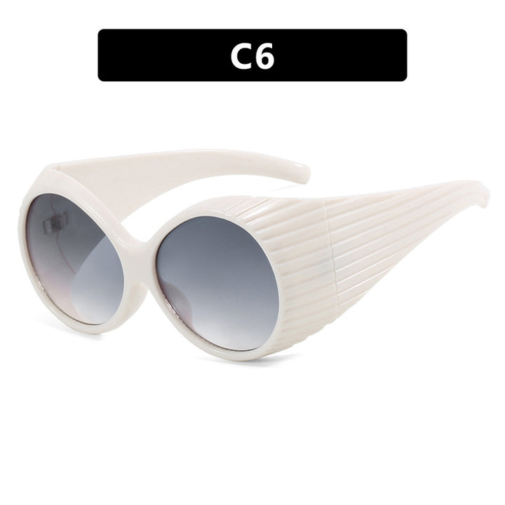 Women's extravagant sunglasses with curved frame Bowlift
