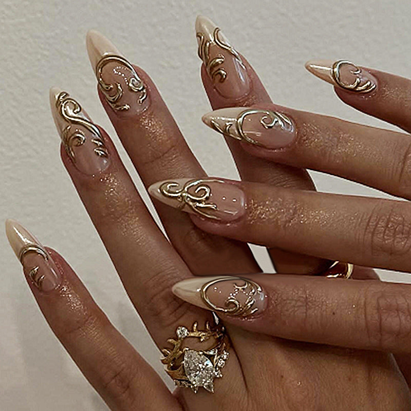 Acrylic nail set with elegant golden decorations Bowlift