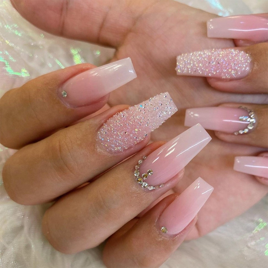 Artificial nail set with sparkling glitter effects and delicate winter motif Bowlift