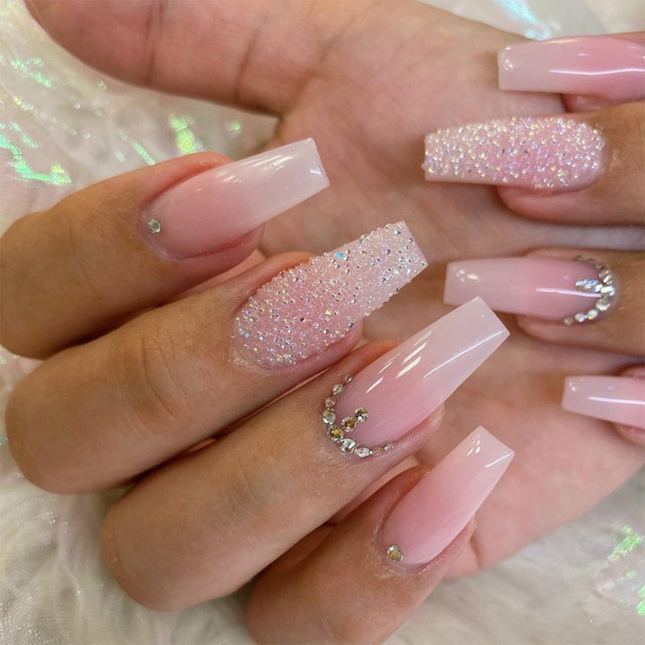 Artificial nail set with sparkling glitter effects and delicate winter motif Bowlift