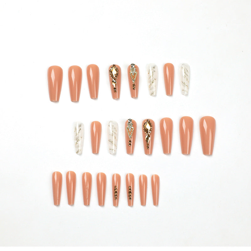 Artful nail extensions with glitter embellishments and delicate accents Bowlift