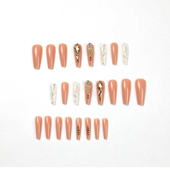 Artful nail extensions with glitter embellishments and delicate accents Bowlift