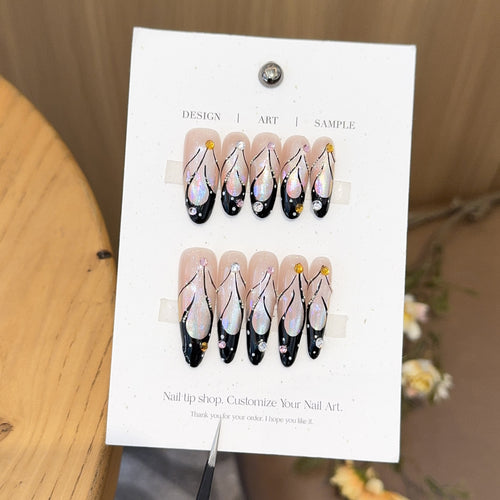 Artificial nails with artistic holographic accents Bowlift