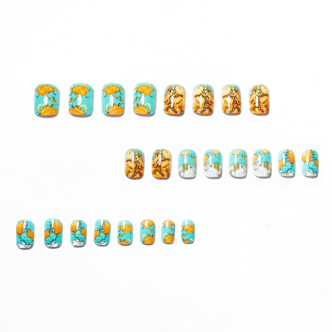 Creative artificial nails with world map inspired design Bowlift