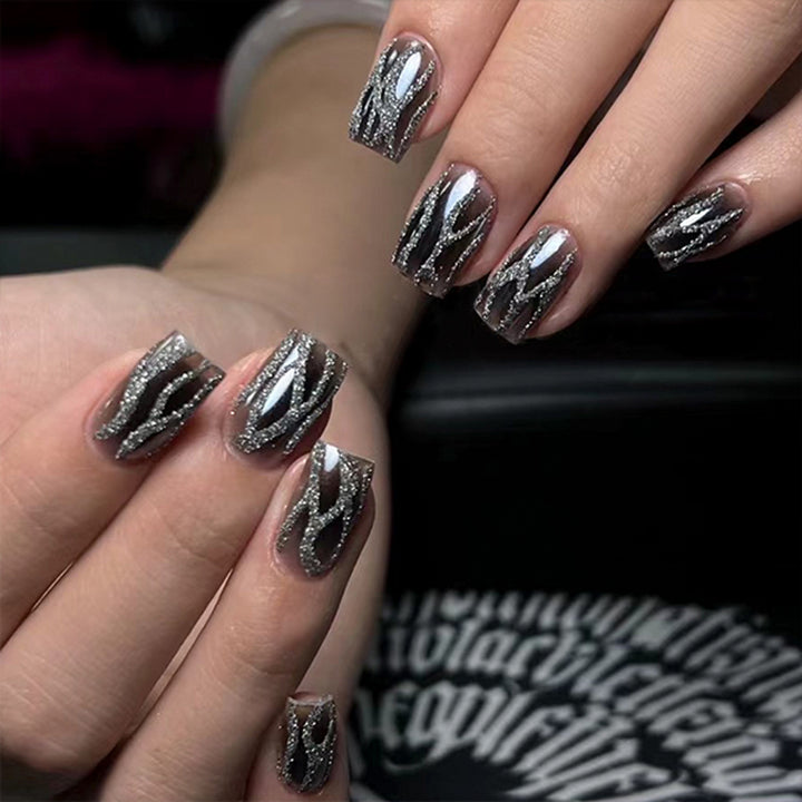 Glamorous gel nails with shimmering pattern Bowlift
