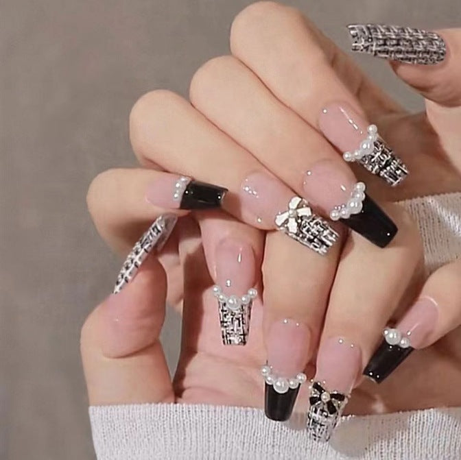 Glamorous nail designs with pearl and rhinestone accents Bowlift