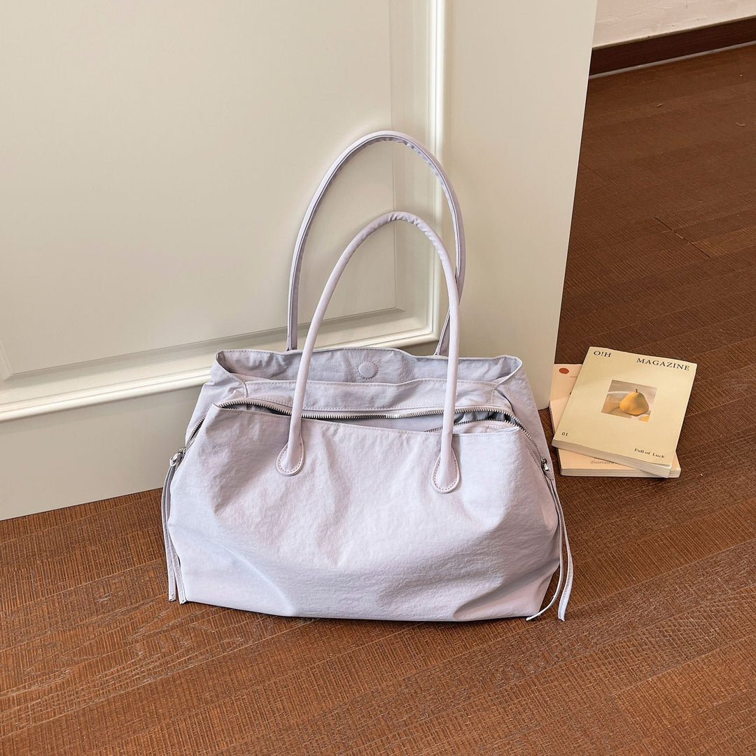 Elegant and Multifunctional Handbag Bowlift