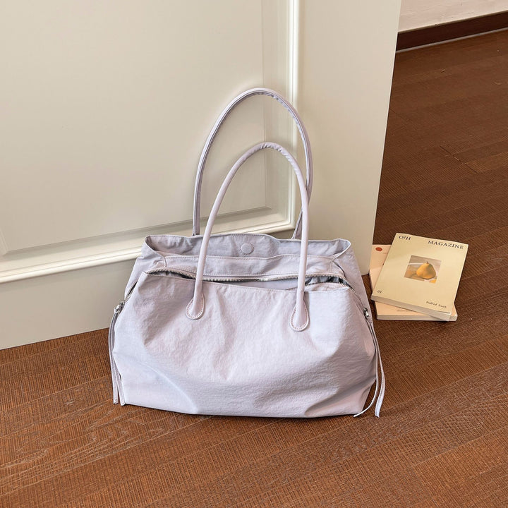 Elegant and Multifunctional Handbag Bowlift
