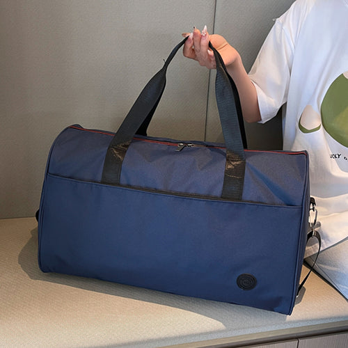 Sporty travel bag with sturdy carrying handles and removable shoulder strap Bowlift