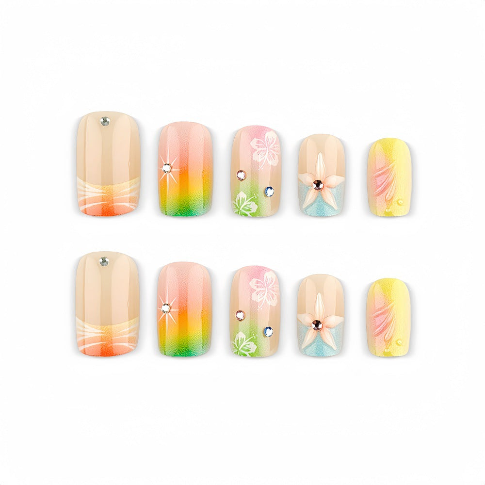 Acrylic nails with floral accents and gradient Bowlift