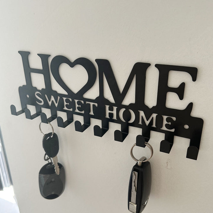 Wall coat rack with heart motif Bowlift