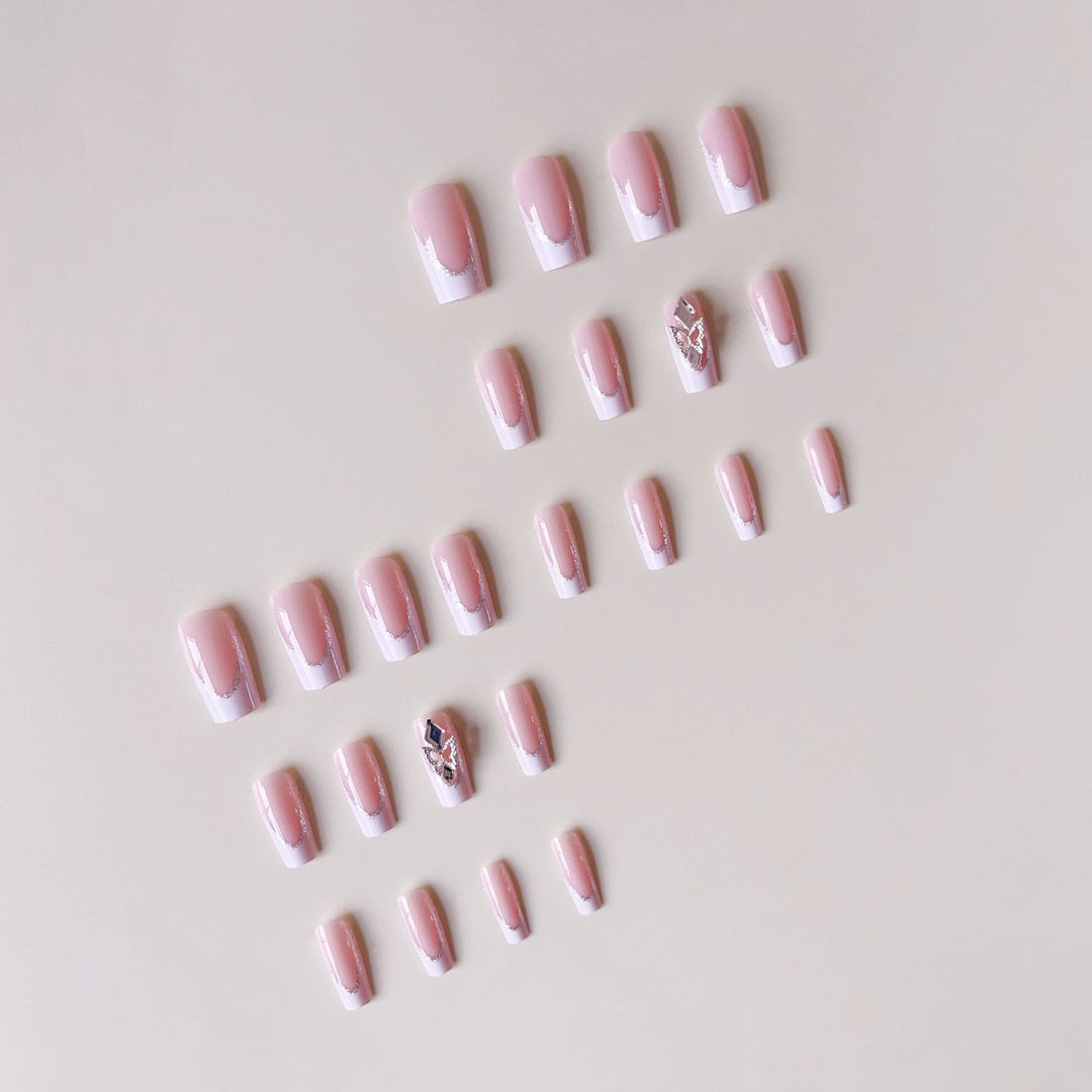 Acrylic nail set with elegant rhinestone and modern tip decorations Bowlift