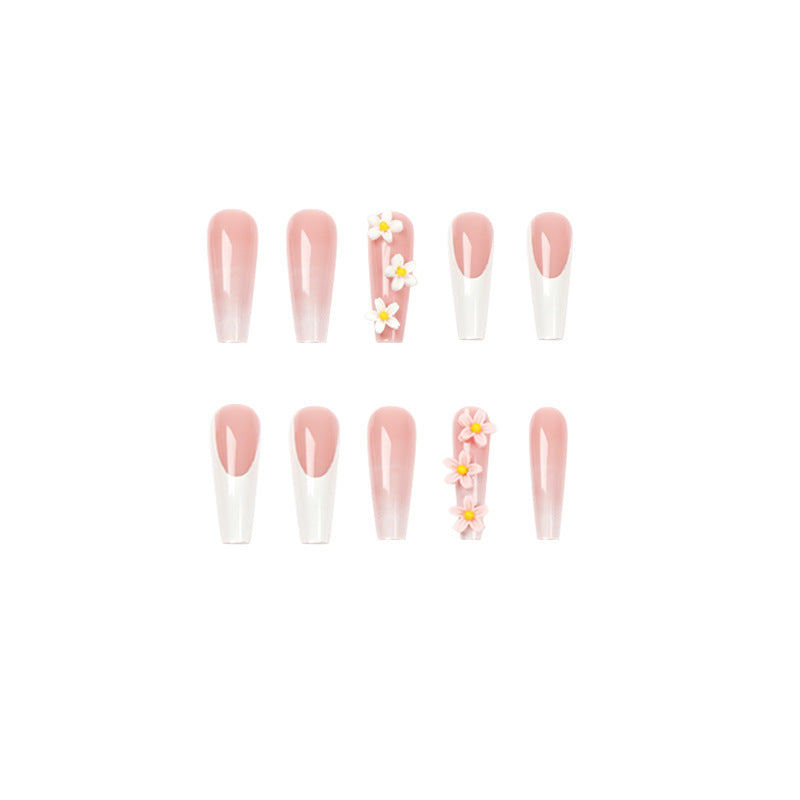 Artful nail extensions with elegant gradient and creative floral accents Bowlift