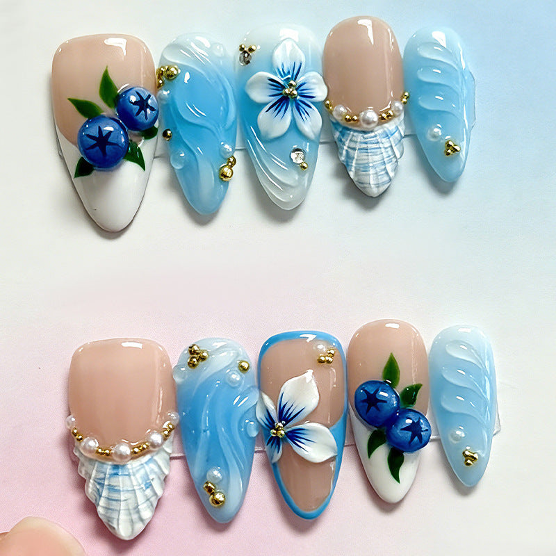 Artificial nail set with floral accents and sparkling details Bowlift