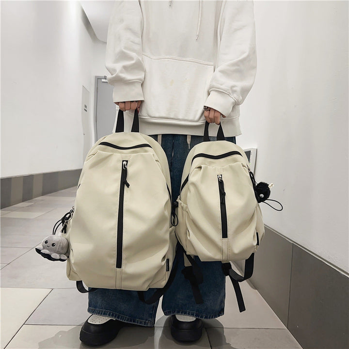 Backpack with Charming Animal Pendant and Innovative Storage Bowlift