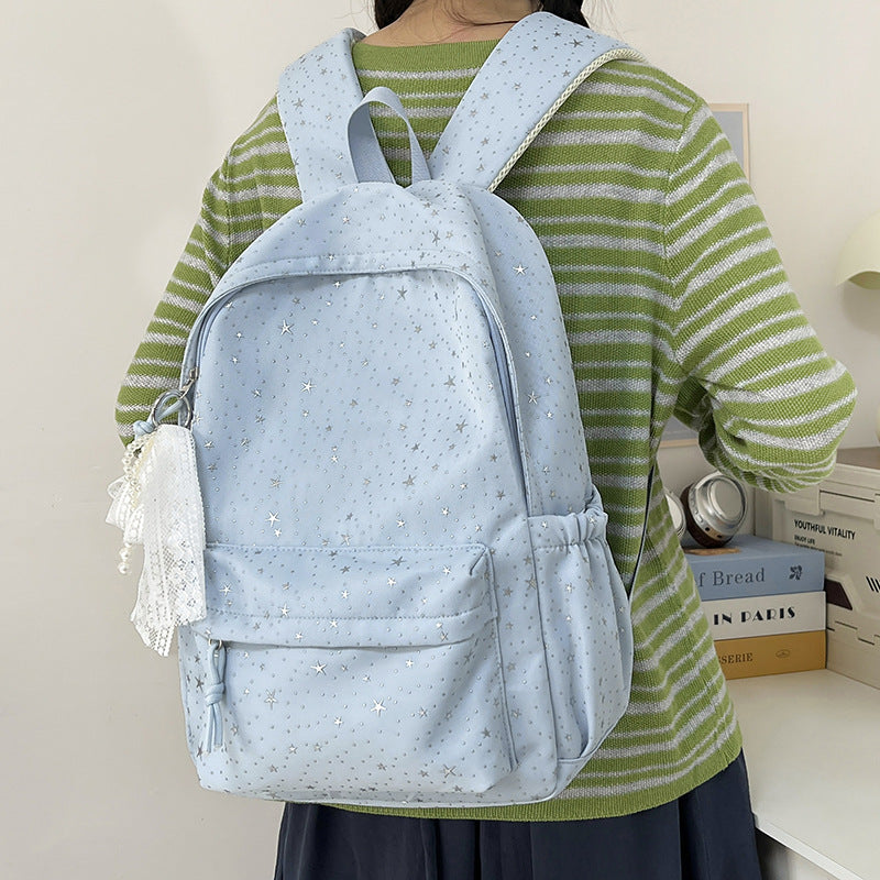 Elegant backpack with glittering stars and practical compartments Bowlift