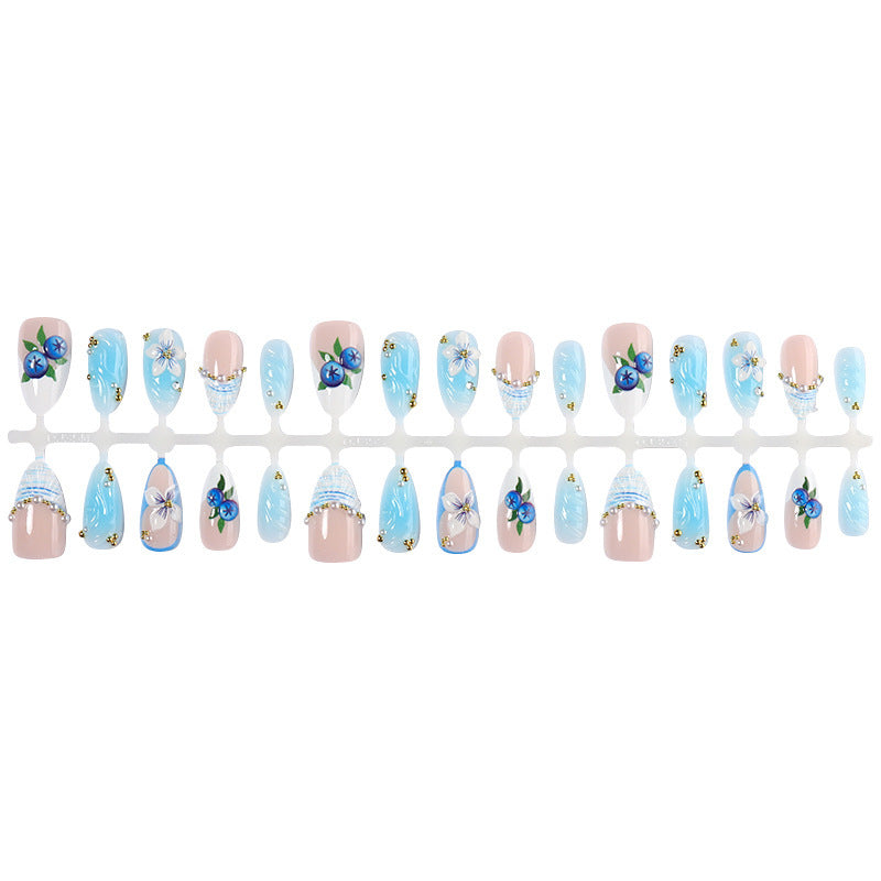 Artificial nail set with floral accents and sparkling details Bowlift