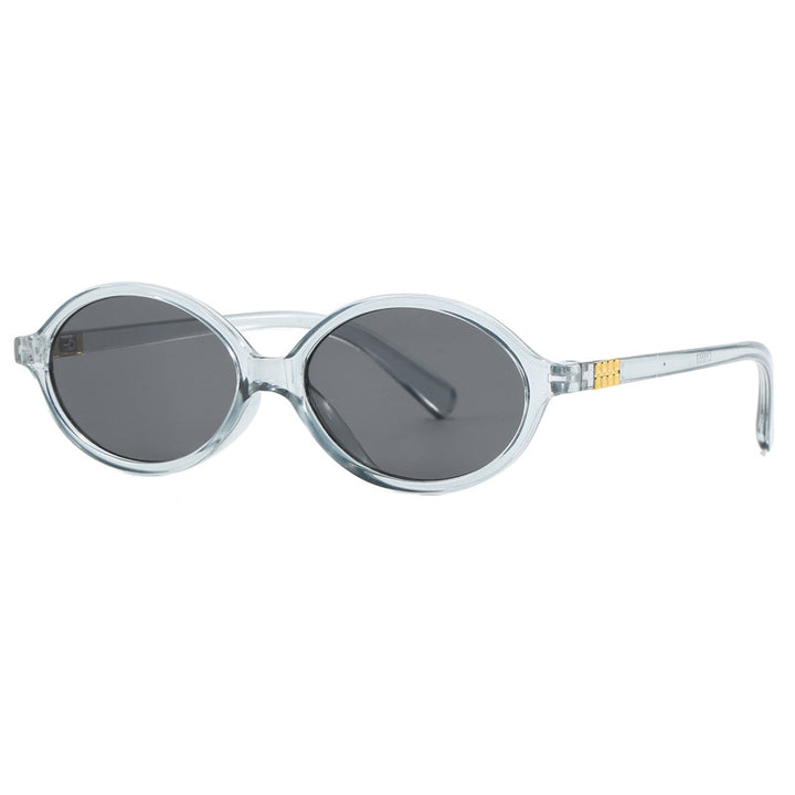 Women's fashionable sunglasses with oval frame and golden accents Bowlift