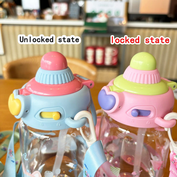 Women's transparent drinking bottle with ergonomic carrying handle and integrated straw Bowlift