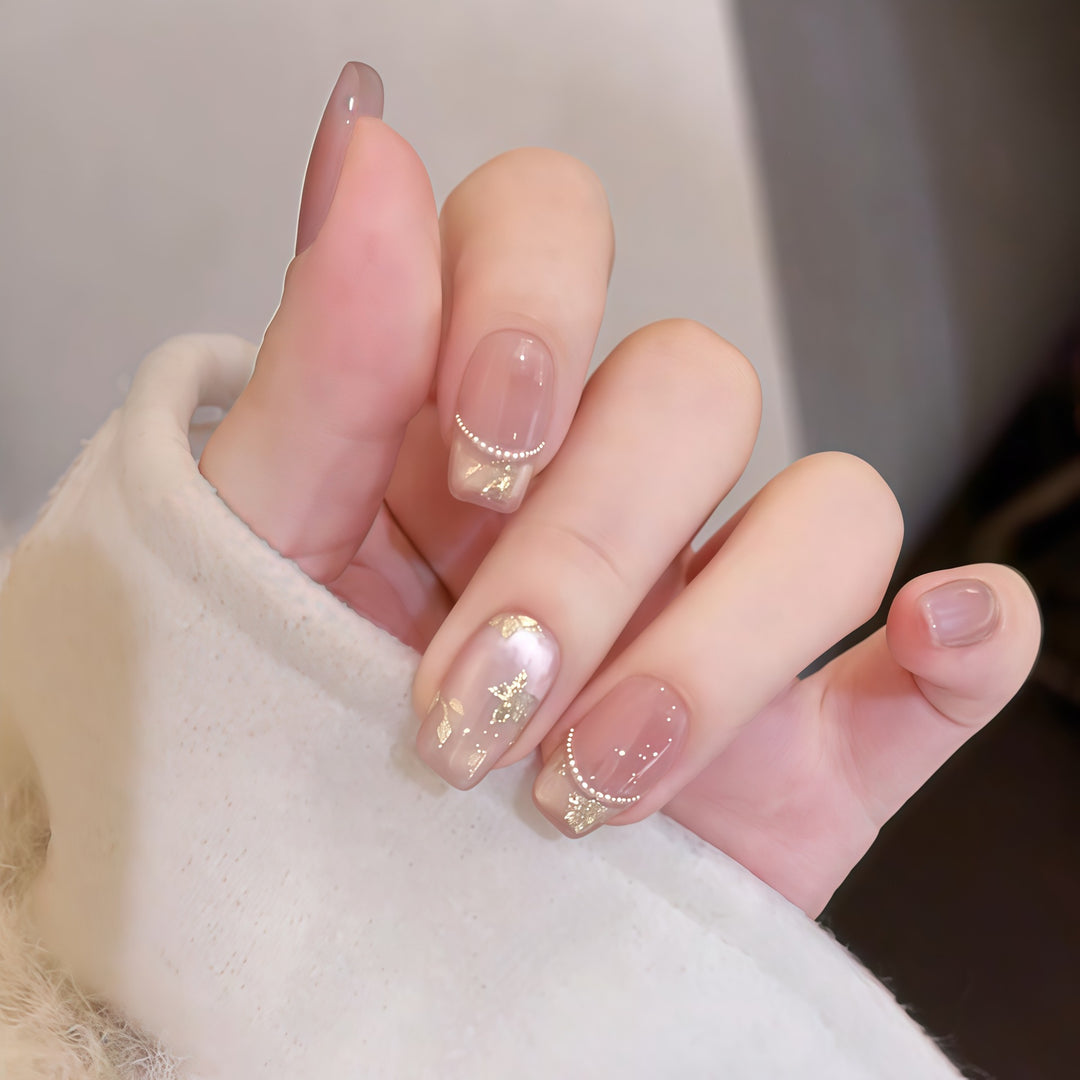 Artificial nails with elegant gold designs Bowlift