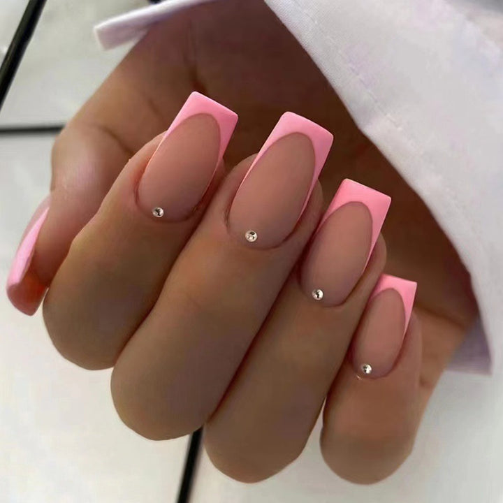 Nail set with elegant French design and glitter accents Bowlift