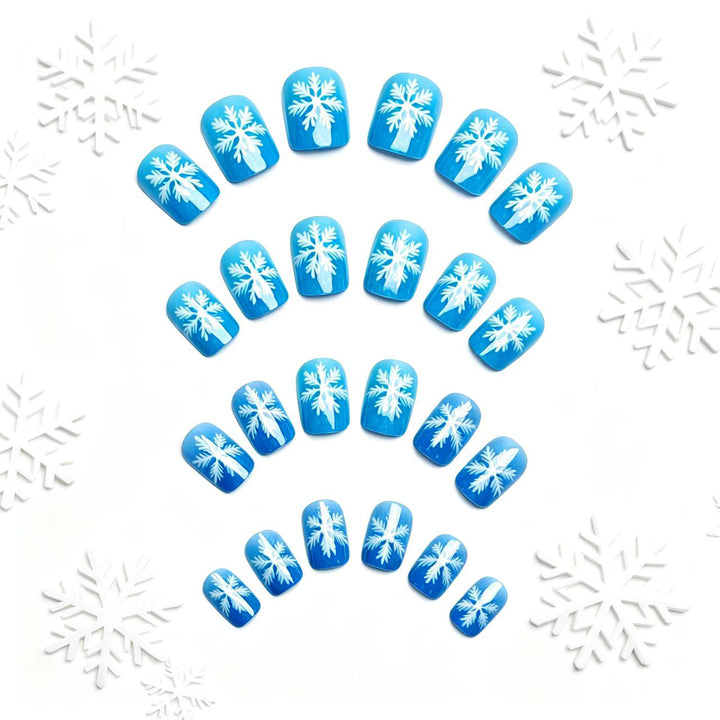 Artificial nails with sparkling winter flake design Bowlift