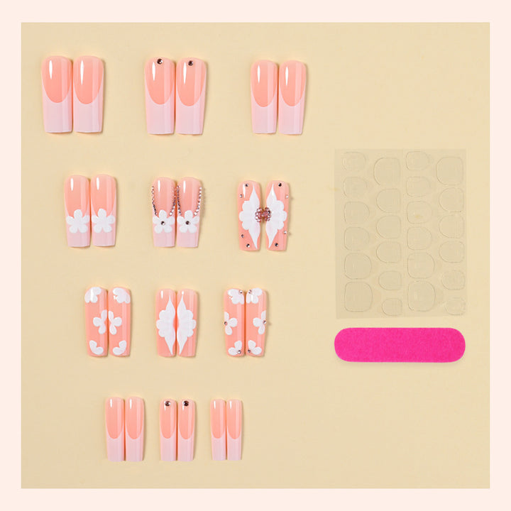 Artificial nail set with delicate flower and glitter details Bowlift