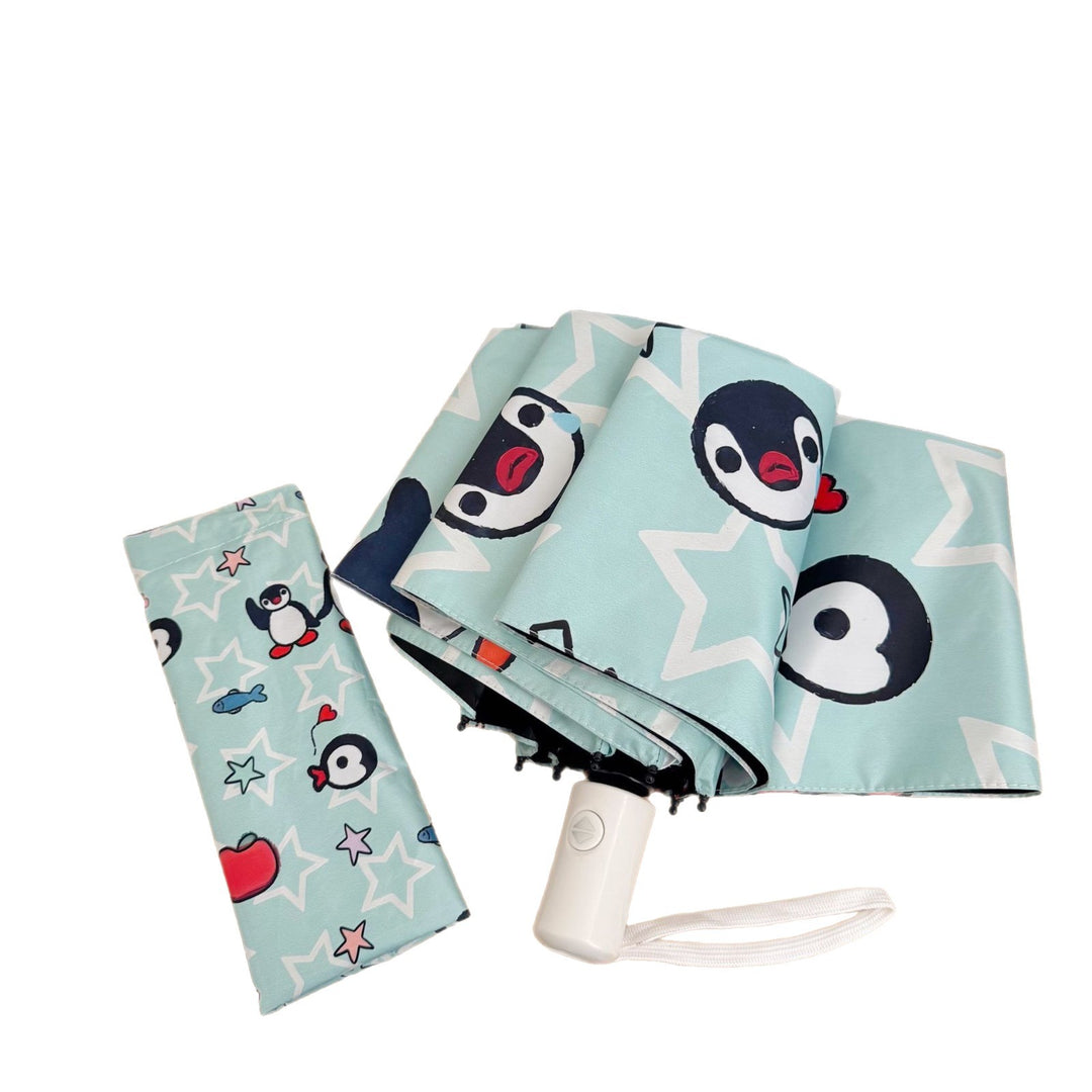 Ladies collapsible umbrella with playful penguin design Bowlift
