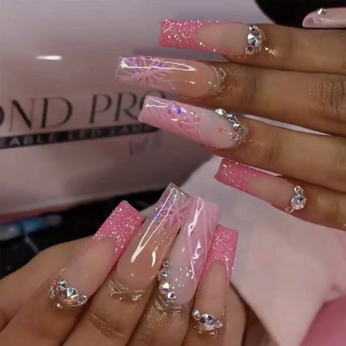 Artistic stiletto nails with glitter and snowflake design Bowlift