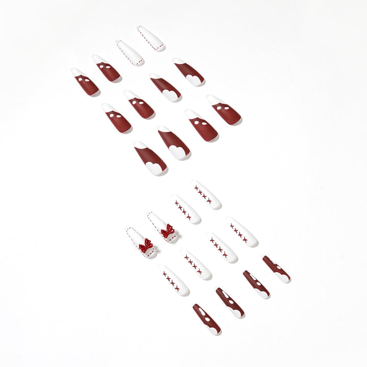 Artful stiletto nails with bow and zigzag design Bowlift