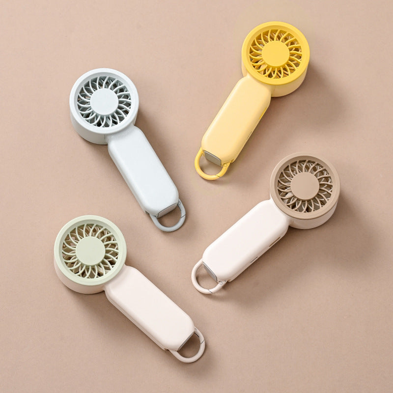 Unisex portable hand fan with rechargeable battery, quiet brushless motor, ergonomic grip, and carrying loop Bowlift