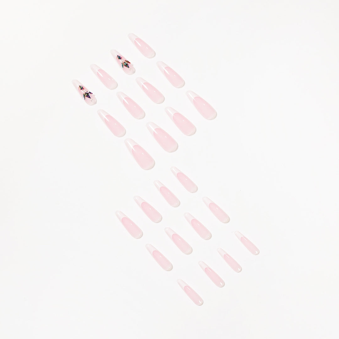 Premium Nail Extensions with Elegant Designs and Glitter Accents Bowlift