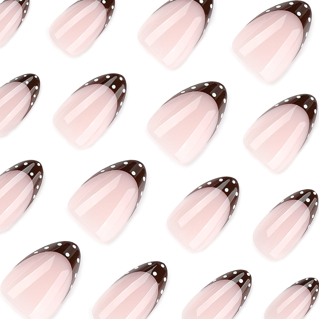 Artful nail art with elegant French tips and glitter accents Bowlift