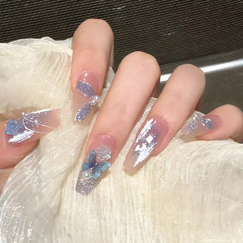 Artistic 3D nail extensions with glitter accents Bowlift