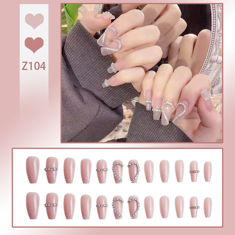 Glamorous artificial nails with heart and glitter design Bowlift
