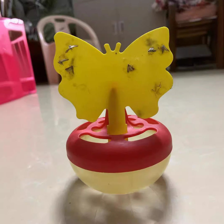 Butterfly-shaped sticky insect trap with refillable liquid reservoir and reusable base Bowlift