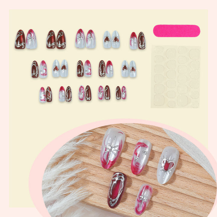 Artificial nail set with romantic decorations and glitter Bowlift