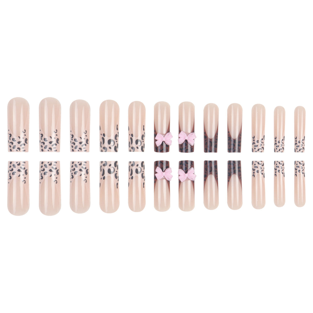Decorative Stiletto Nail Extensions with Bow Accents Bowlift