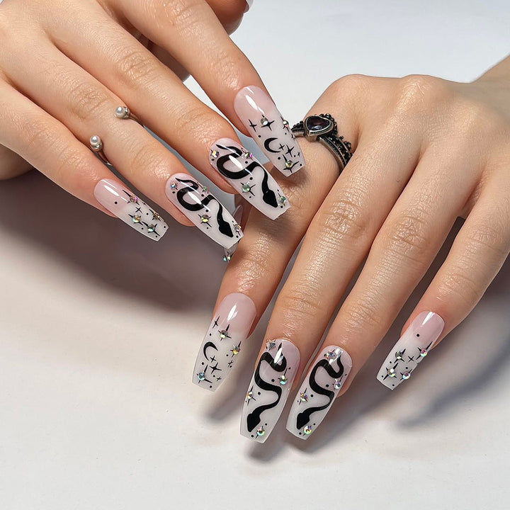 Artful gel nails with elegant 3D design and glitter accents Bowlift