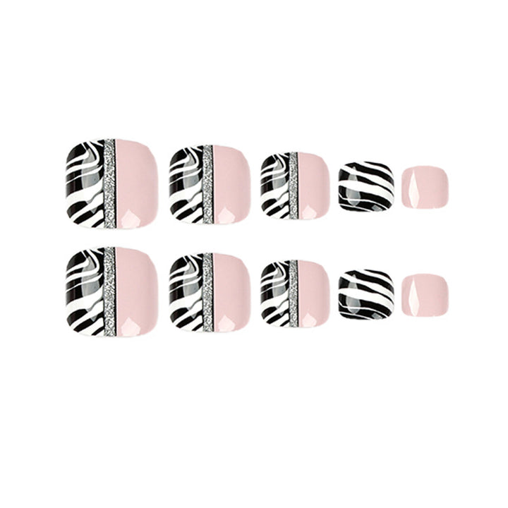 Artistic toenail art with zebra pattern and glitter accents Bowlift