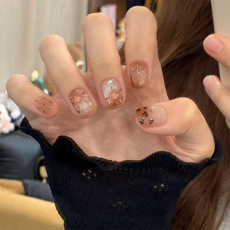 Glamorous artificial nail tips with 3D flower and crystal embellishments Bowlift