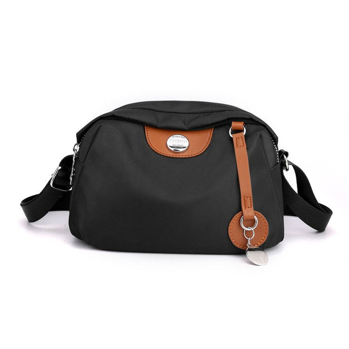 Shoulder bag with adjustable shoulder strap and clear compartment system Bowlift