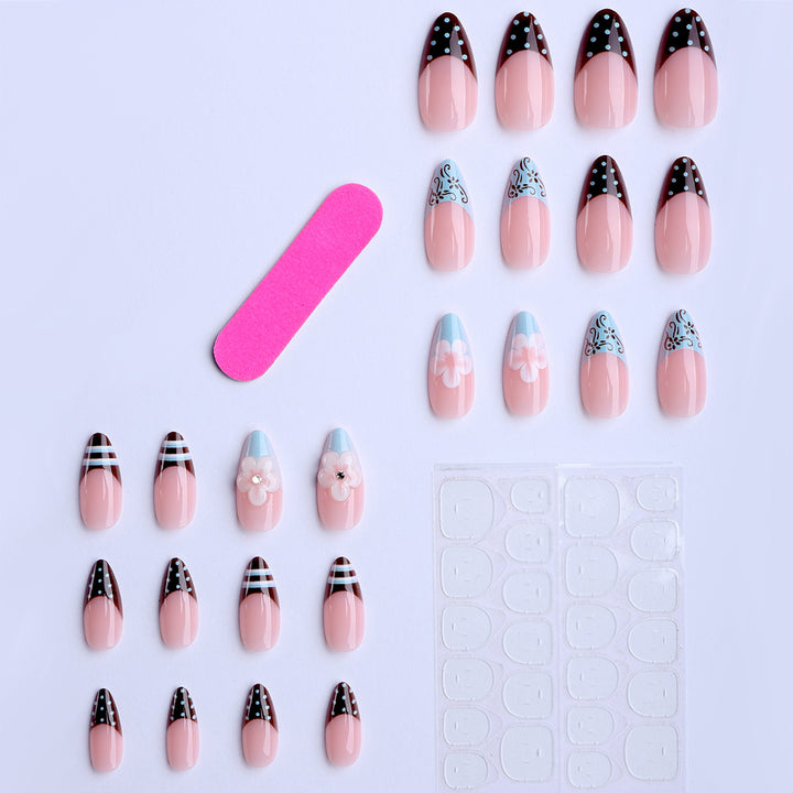 Artificial nails with creative floral design and elegant accent colors Bowlift
