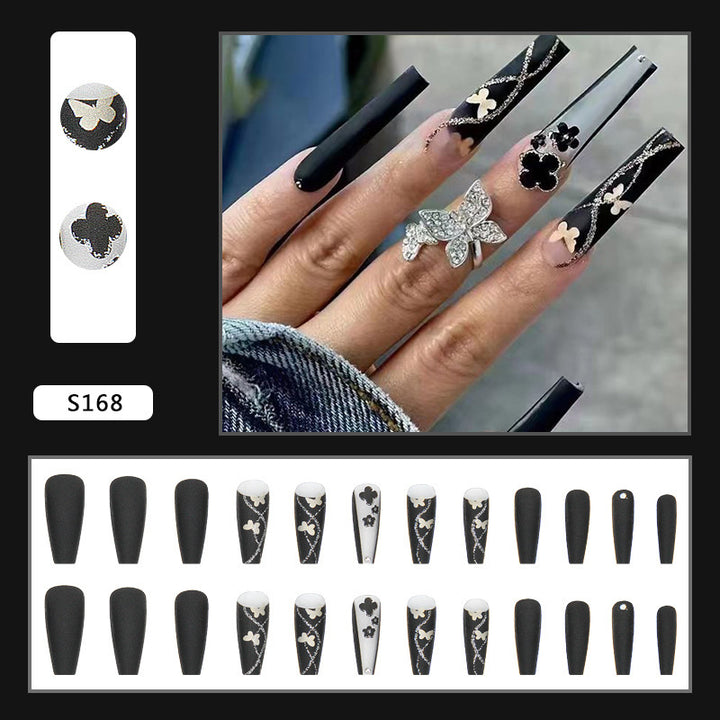 Art nail set with elegant butterfly and flower motifs Bowlift